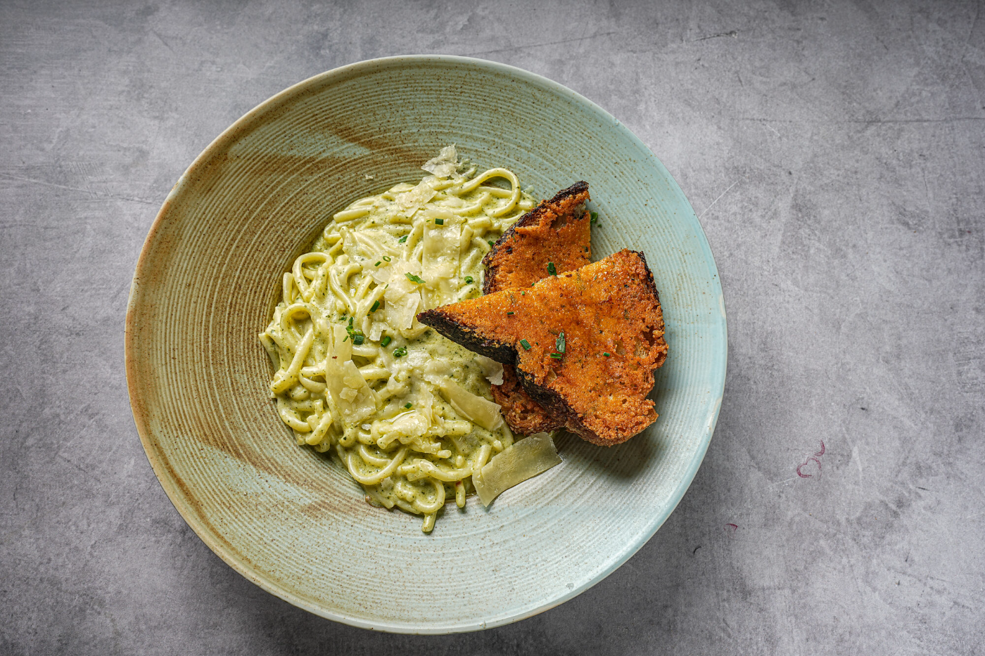 Grilled steak with herb butter, served tableside