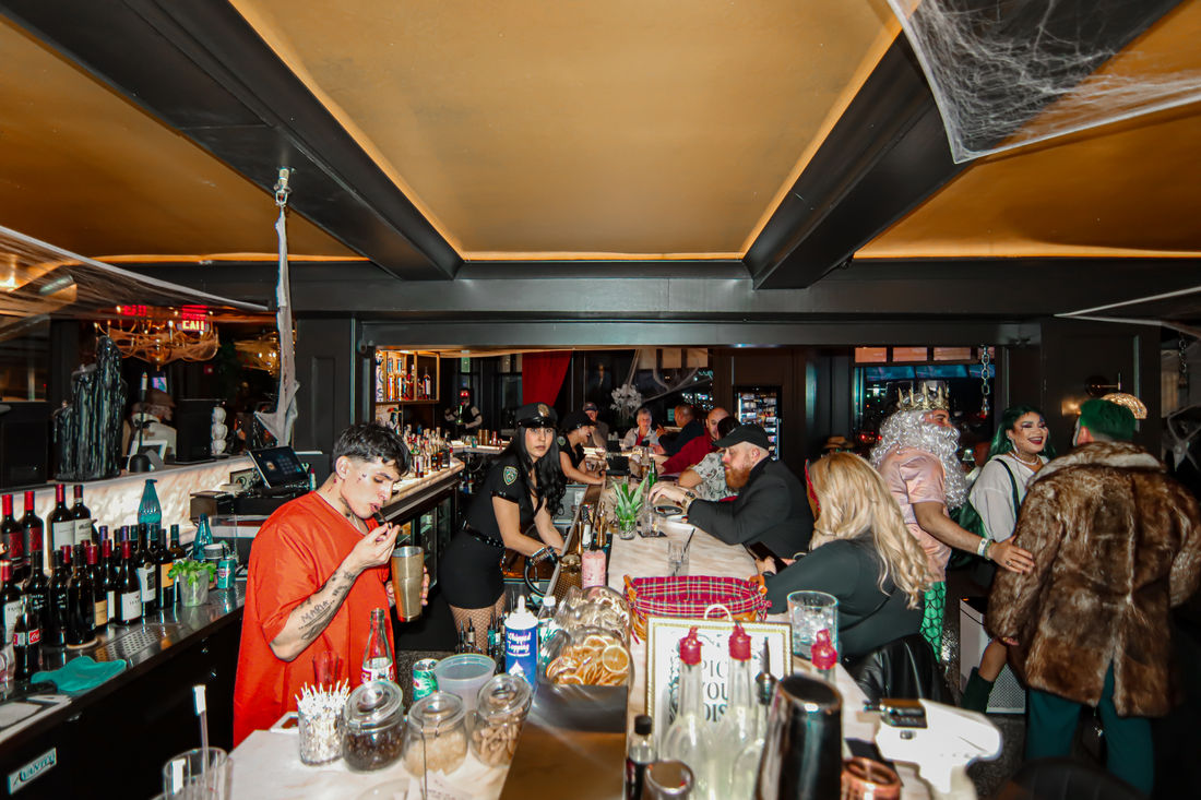 Bartender crafting a signature cocktail