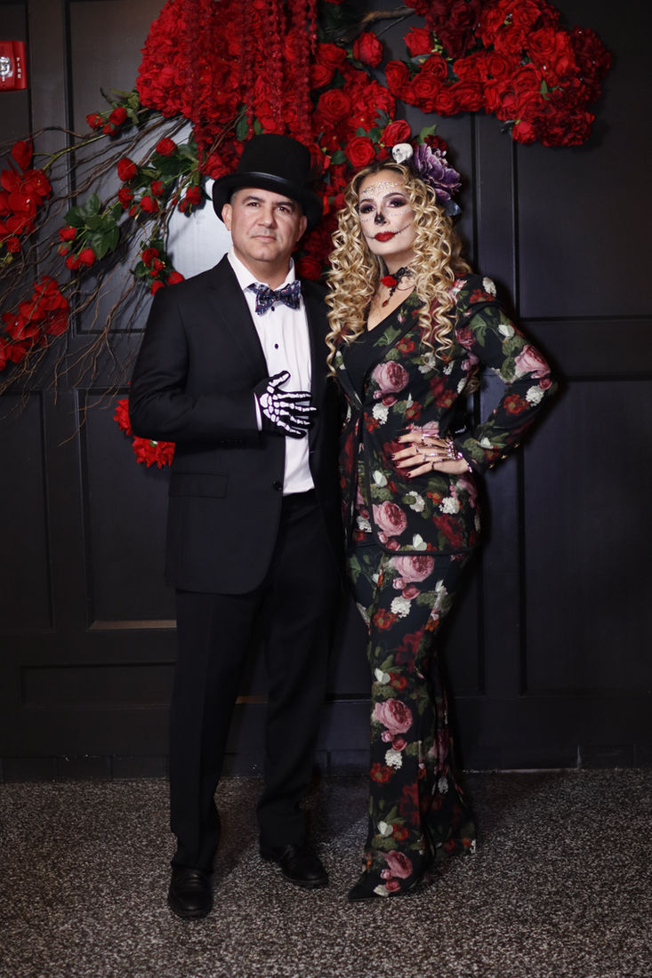 Costumed couple at a themed event